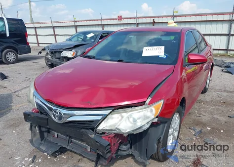 2012 Toyota Camry Le z USA, uszkodzony, nr VIN 4T4BF1FK3CR207907